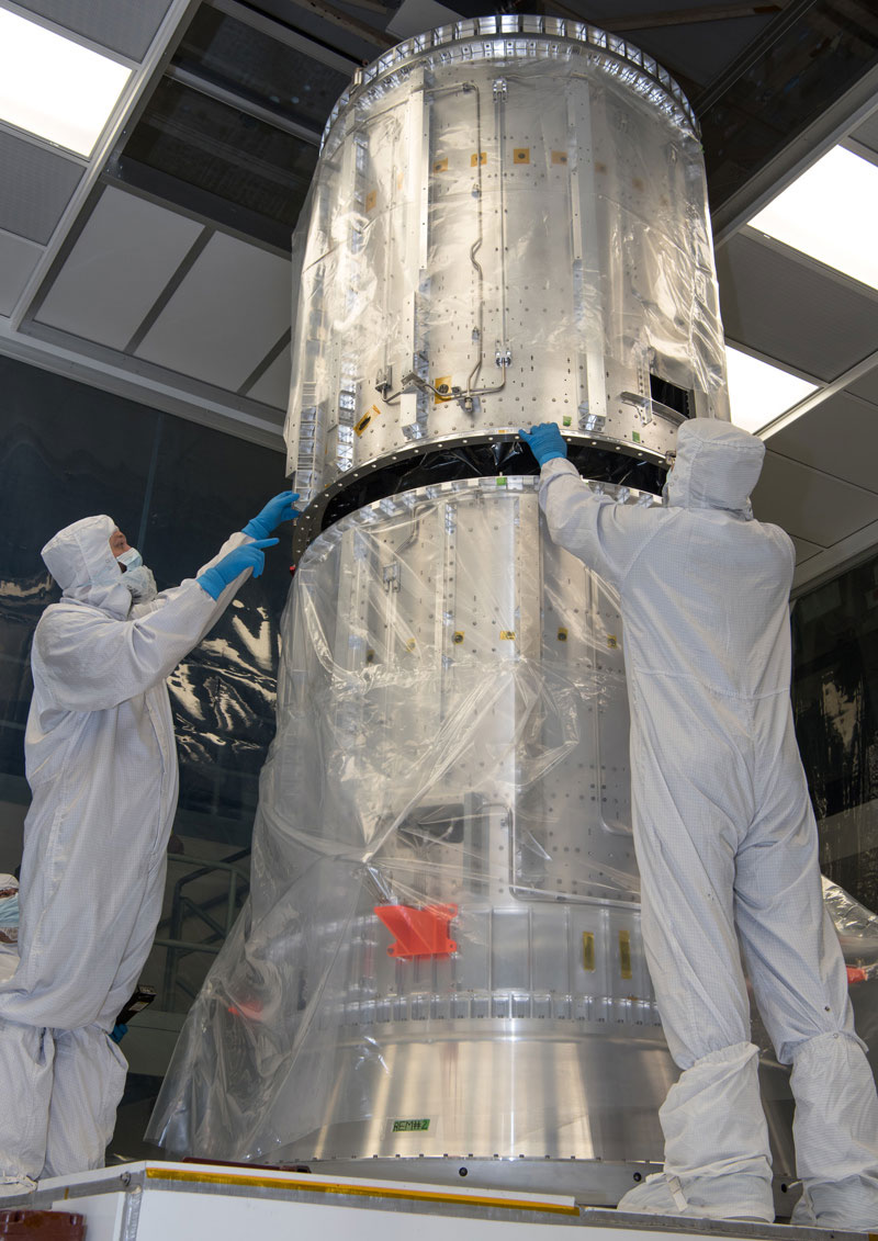 Technicians at NASA's Goddard Space Flight Center check the fit of the cylinders of the propulsion module core of NASA's Europa Clipper spacecraft on Oct. 15, 2020.