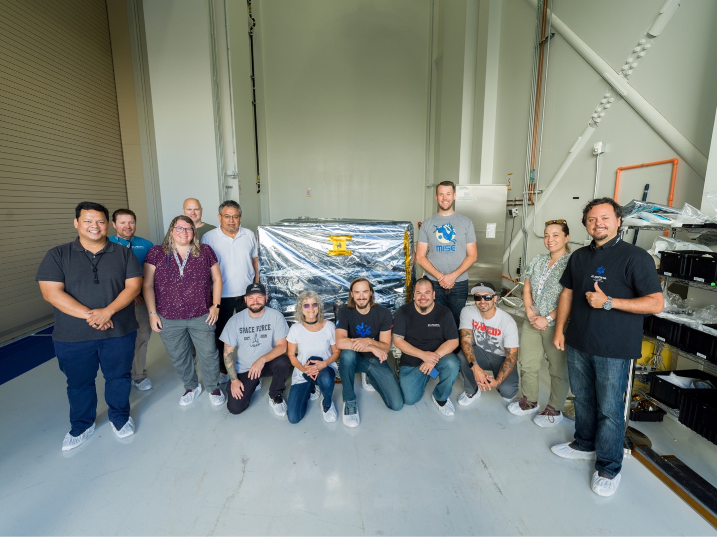 Europa Clipper’s Mapping Imaging Spectrometer for Europa, called MISE, was delivered to NASA’s Jet Propulsion Laboratory (JPL) in July 2023. Seen in this image are some of the engineers and technicians from JPL who built and tested the instrument. Credit: NASA/JPL-Caltech