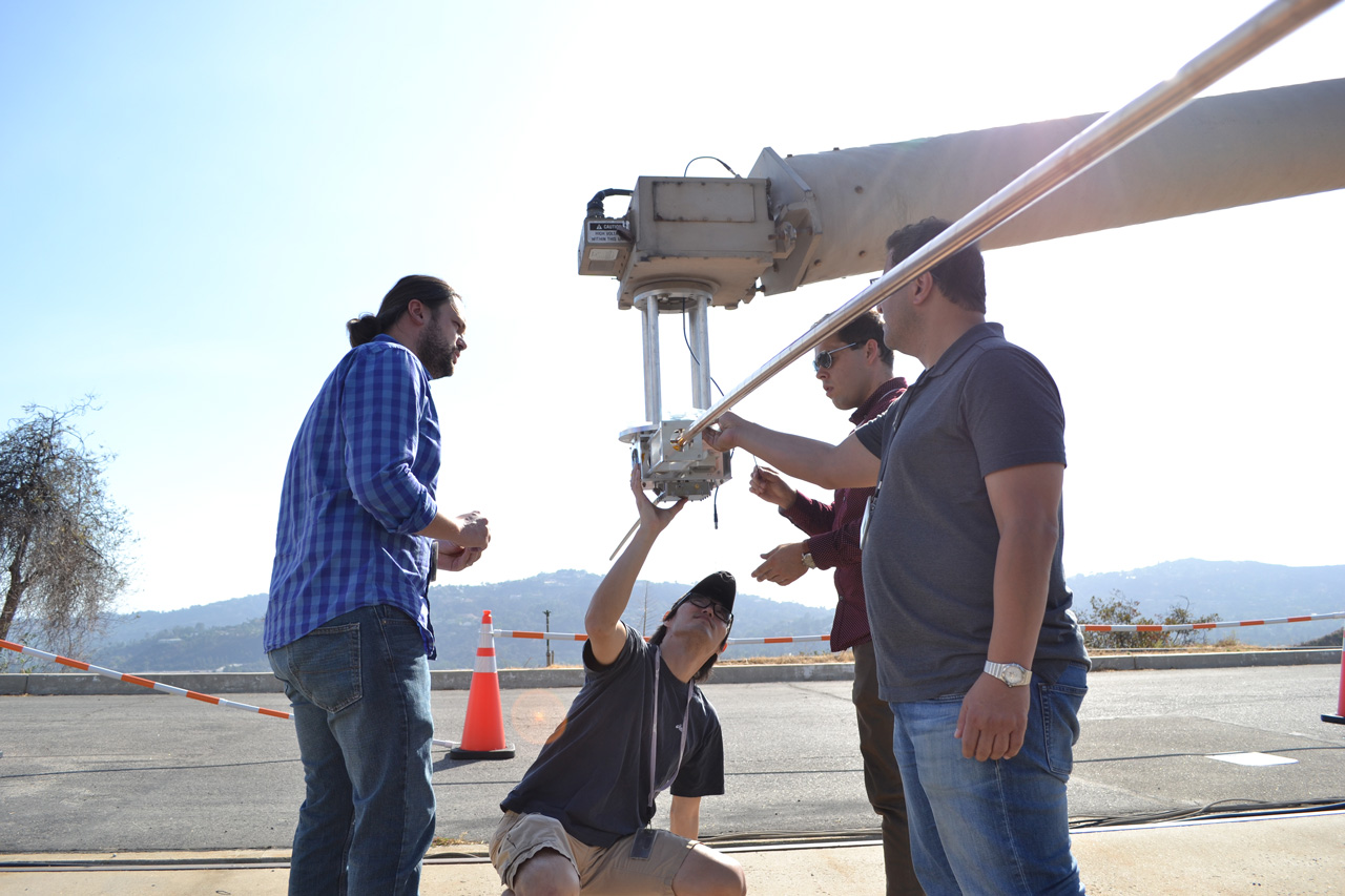 engineers working on a spacecraft instrument at JPL