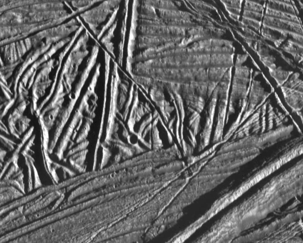 Various linear ridges on Europa as seen from orbit.