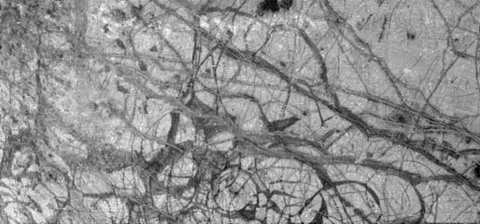 cracked, icy surface in black and white