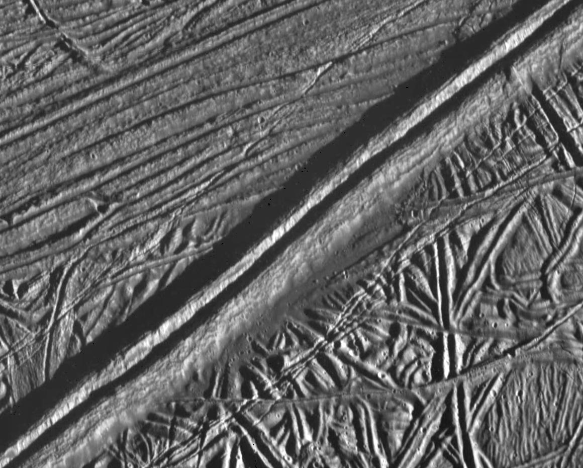 black and white view of ridges on an icy surface