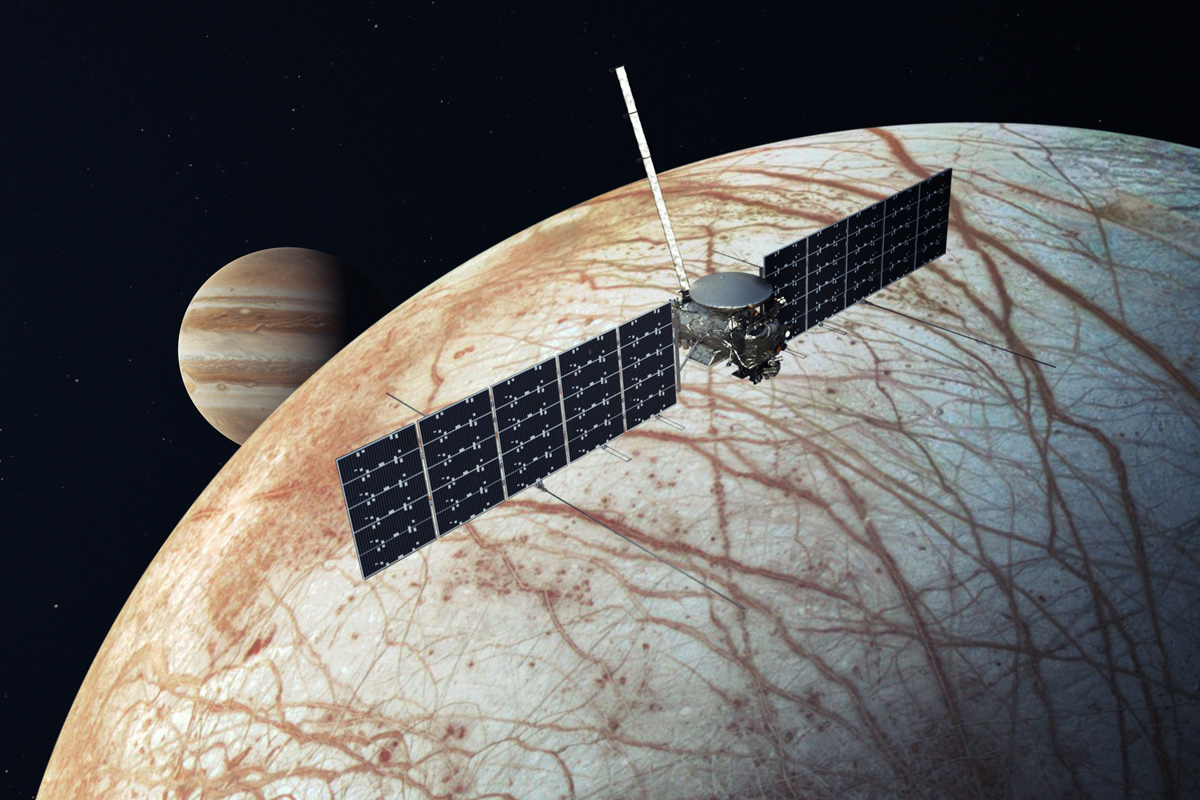 artist's rendering of the Europa Clipper spacecraft with Europa and Jupiter in the background