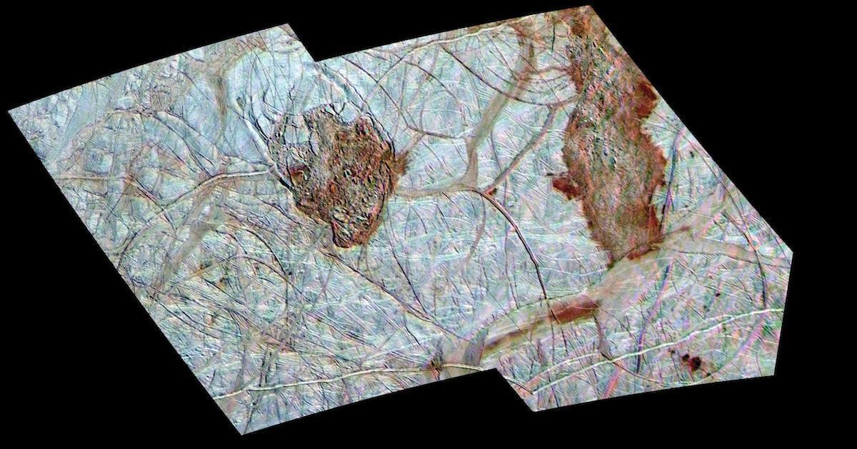 color view of two darker regions on an icy terrain