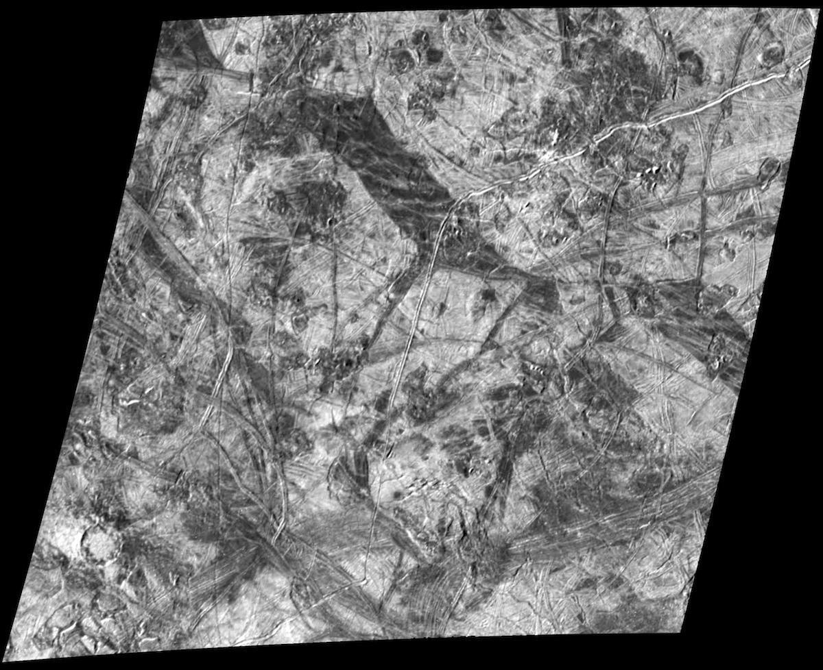 black and white view of rough terrain on an icy surface