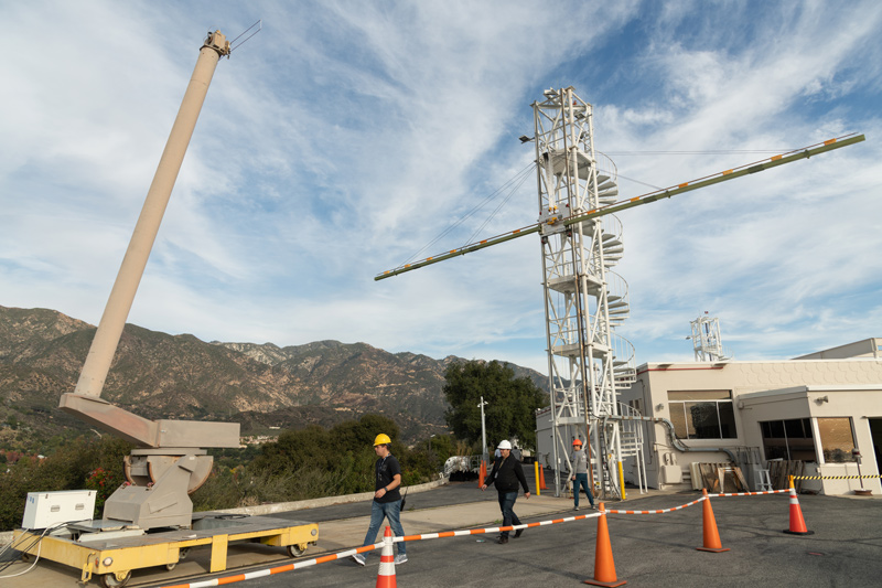 Engineers test one of two high frequency radar antennas for Europa Clipper’s REASON instrument on a hilltop at NASA’s Jet Propulsion Laboratory.
