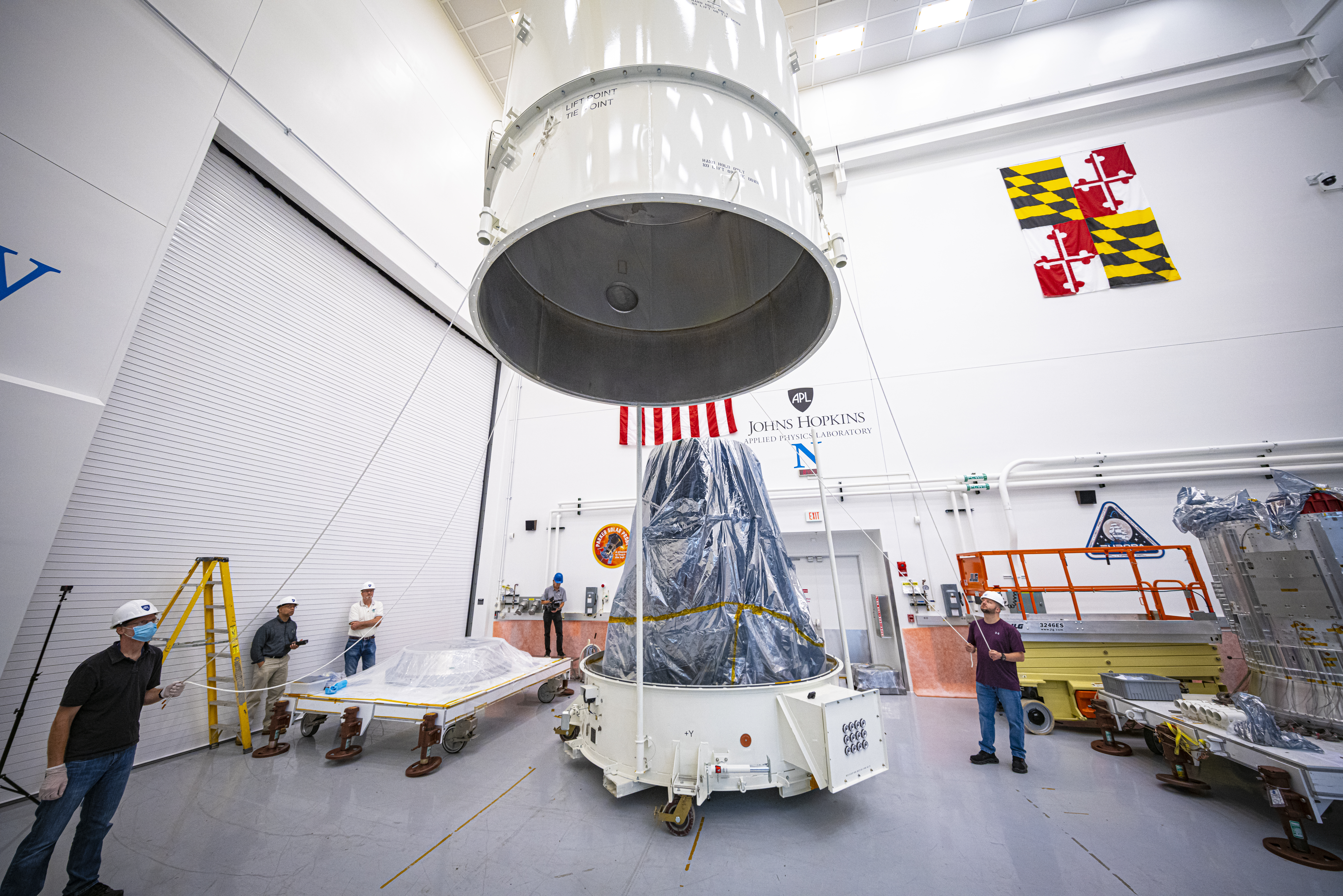 Engineers removing Europa Clipper's propulsion module from its shipping container