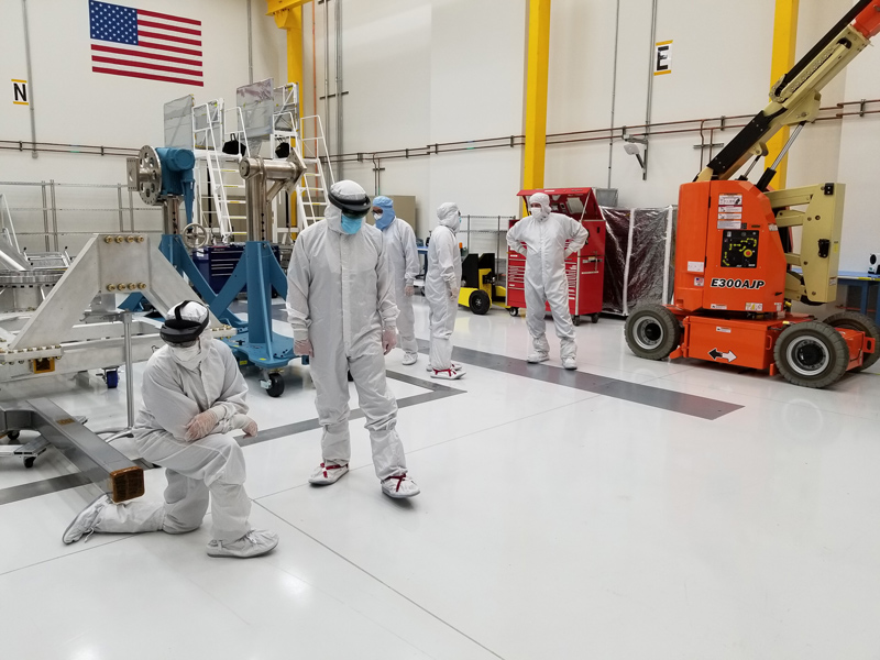 Europa Clipper engineers use mixed reality (also known as augmented reality, or AR) headsets to examine Europa Clipper’s avionics module assembly in a clean room at NASA's Jet Propulsion Laboratory.