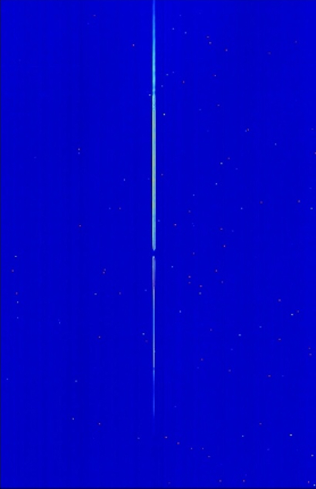 A blue image with a thin vertical white line in the center. 